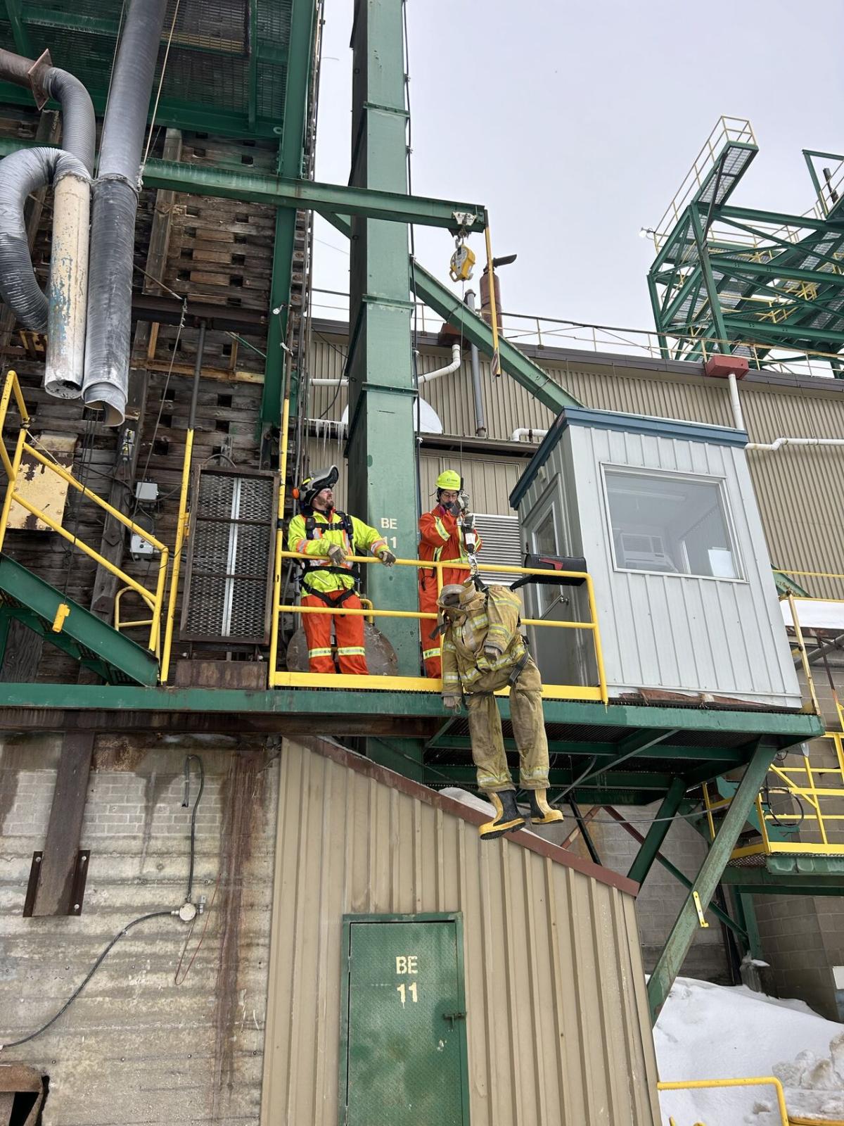 safety crew looking at a building